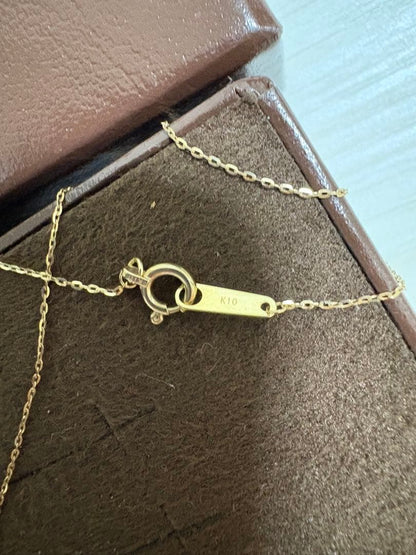 Agete K10 gold necklace with tapered baguette cut diamonds, 39cm length, and delicate pendant