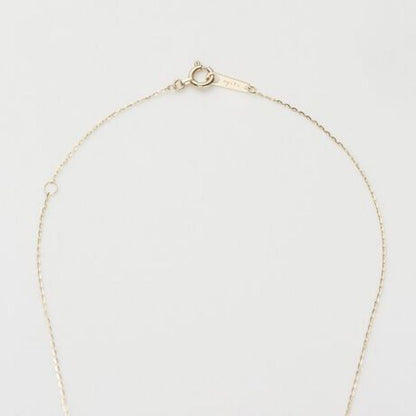 Agete K10 gold necklace with tapered baguette cut diamonds, 39cm length, and delicate pendant