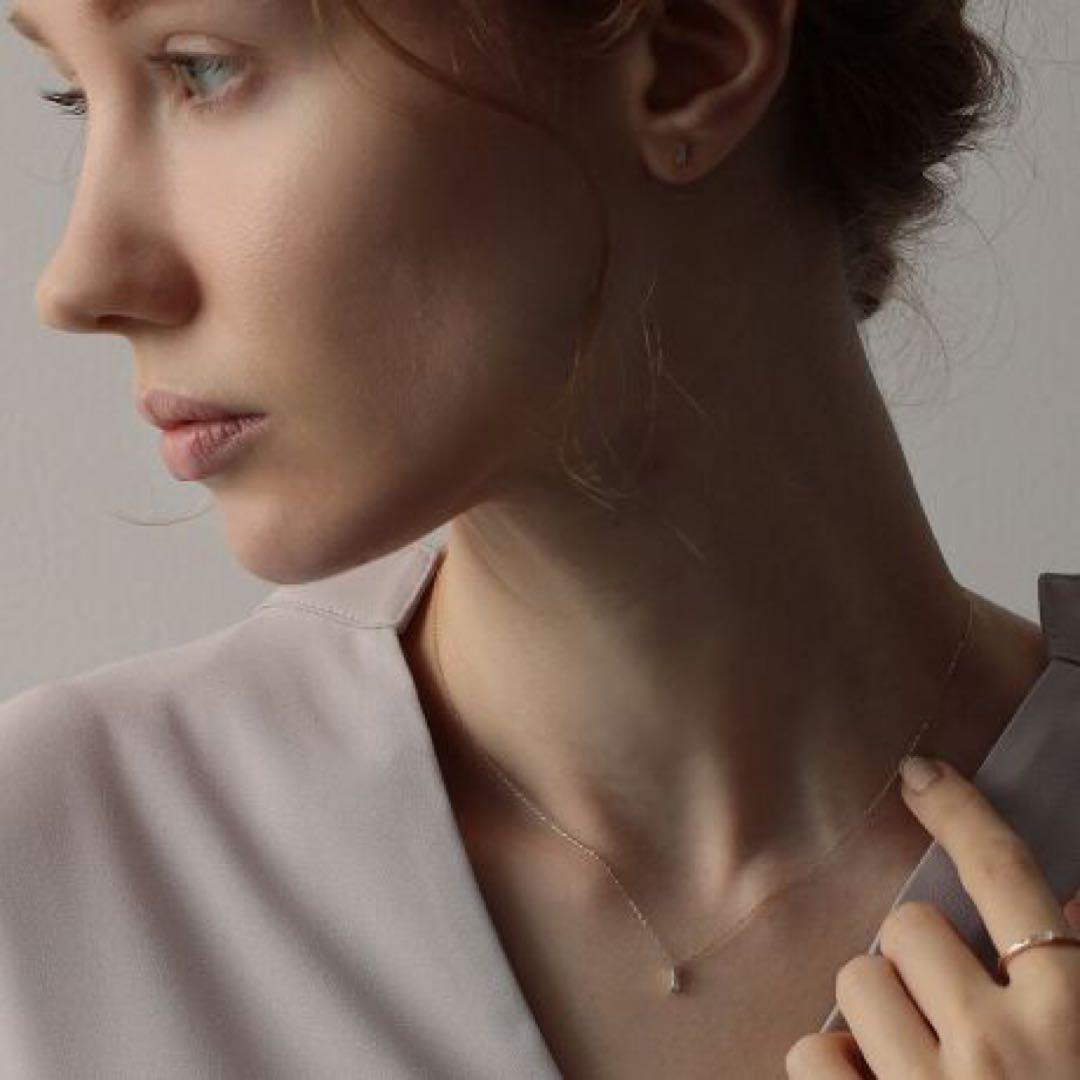 Agete K10 gold necklace with tapered baguette cut diamonds, 39cm length, and delicate pendant