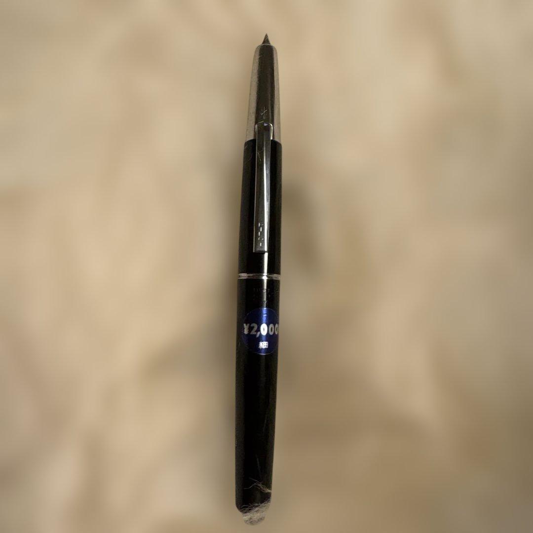Unused Pilot Capless Fountain Pen with 14K fine nib shown uncapped on white background