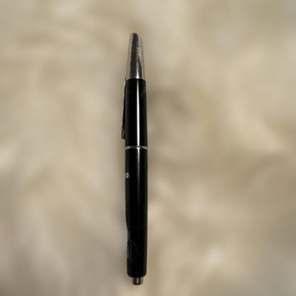 Unused Pilot Capless Fountain Pen with 14K fine nib shown uncapped on white background