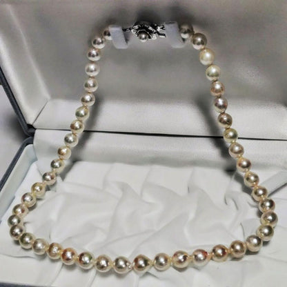 Abyssal Akoya Pearl Necklace in silver with 8.4 mm pearls on a white background