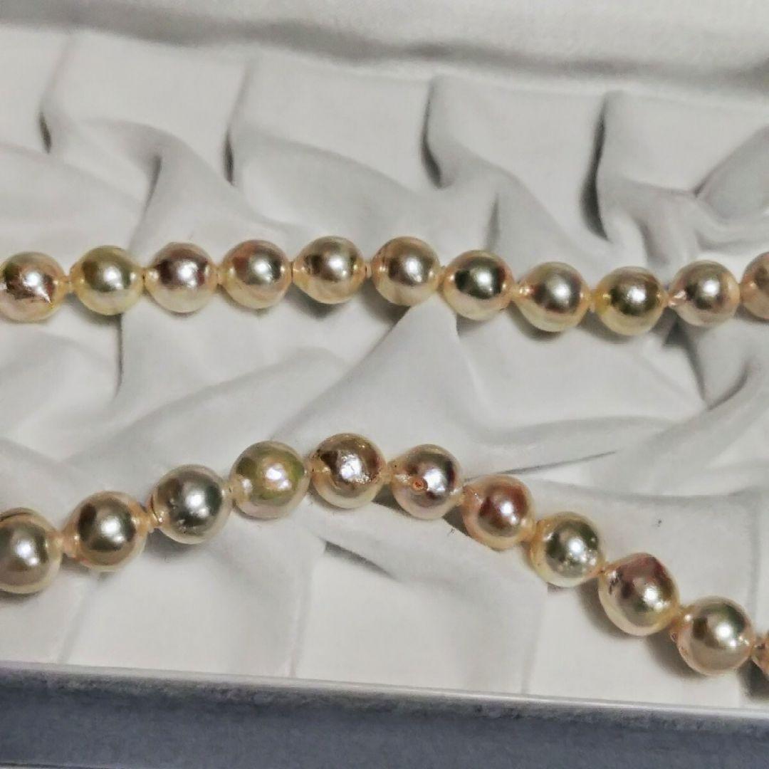 Abyssal Akoya Pearl Necklace in silver with 8.4 mm pearls on a white background