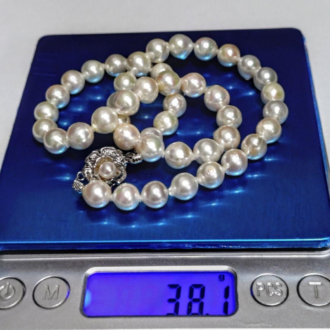 Abyssal Akoya Pearl Necklace in silver with 8.4 mm pearls on a white background