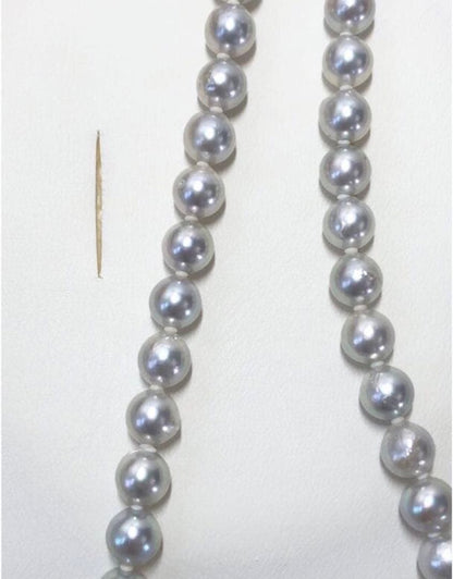 Akoya pearl necklace featuring 6.5-7mm light gray semi baroque pearls on a 39.5cm silver clasp chain