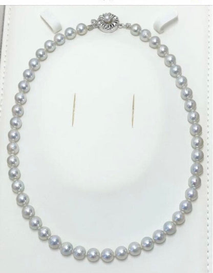 Akoya pearl necklace featuring 6.5-7mm light gray semi baroque pearls on a 39.5cm silver clasp chain
