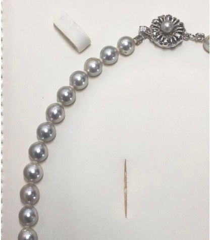 Akoya pearl necklace featuring 6.5-7mm light gray semi baroque pearls on a 39.5cm silver clasp chain