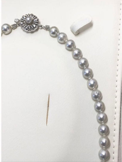 Akoya pearl necklace featuring 6.5-7mm light gray semi baroque pearls on a 39.5cm silver clasp chain
