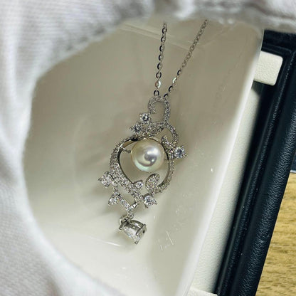 Akoya pearl necklace with 7.5mm unbleached pearls and silver S925 engraved clasp in blue color