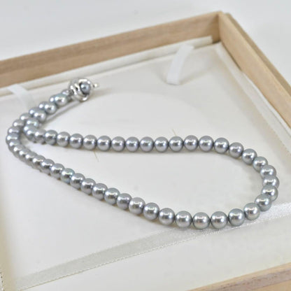 Takatoshi Akoya pearl necklace measuring 41.5 cm with lustrous white pearls and elegant design