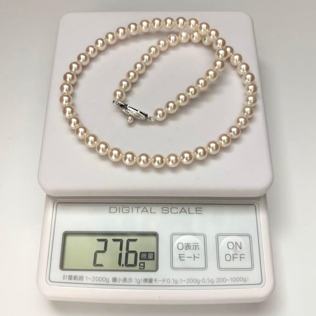 Hanadama Aurora Interference color Akoya pearl necklace in pink white with round 7mm pearls and silver stamp logo