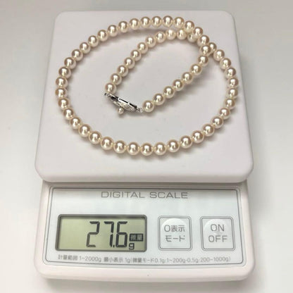 Hanadama Aurora Interference color Akoya pearl necklace in pink white with round 7mm pearls and silver stamp logo