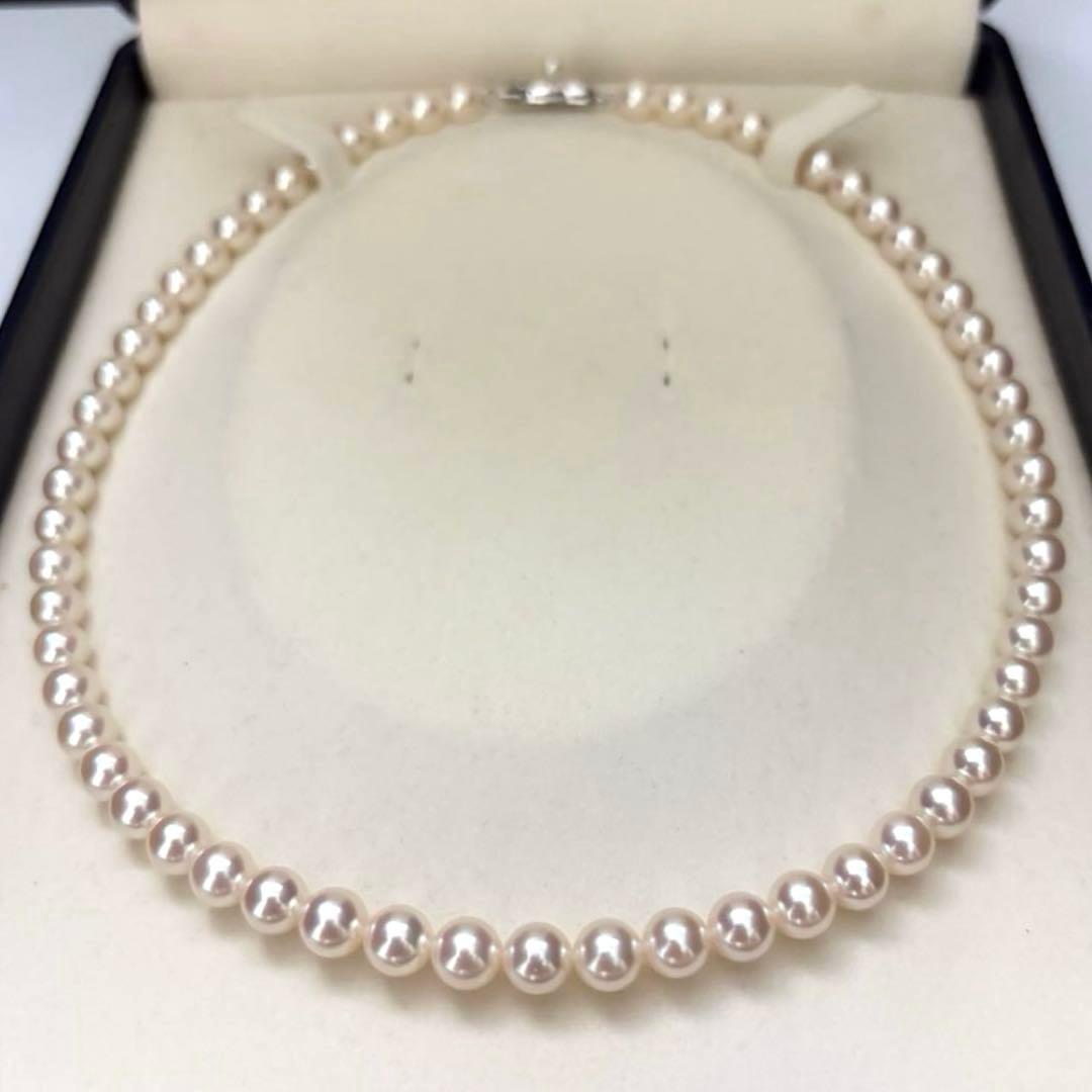 Hanadama Aurora Interference color Akoya pearl necklace in pink white with round 7mm pearls and silver stamp logo