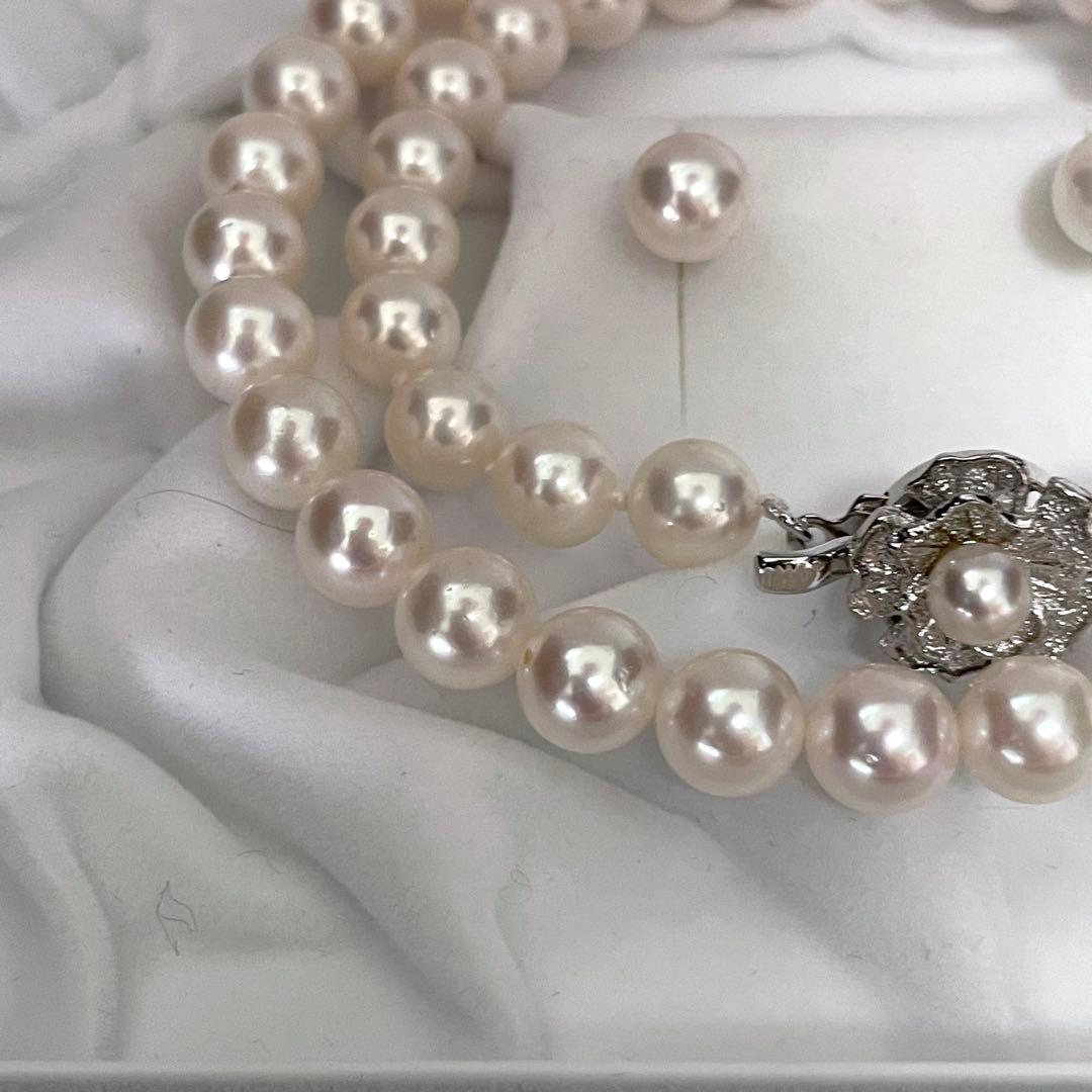Large Akoya pearl earrings and matching necklace set with 7.5-8mm pearls in a jewelry box