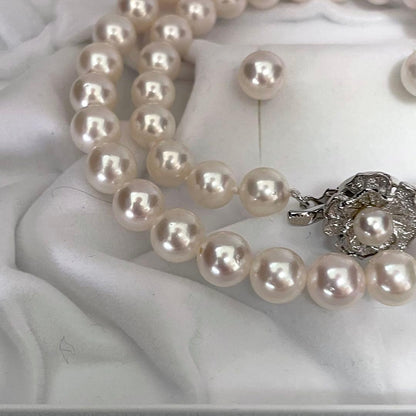 Large Akoya pearl earrings and matching necklace set with 7.5-8mm pearls in a jewelry box