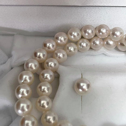 Large Akoya pearl earrings and matching necklace set with 7.5-8mm pearls in a jewelry box
