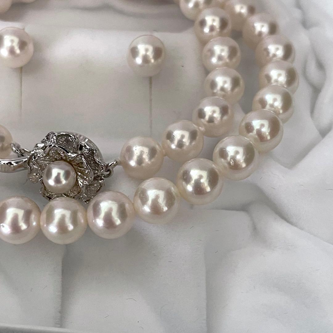 Large Akoya pearl earrings and matching necklace set with 7.5-8mm pearls in a jewelry box