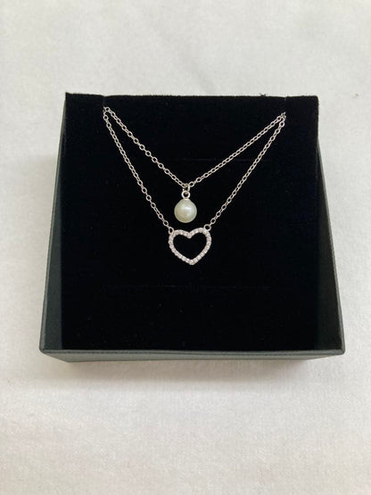Akoya pearl pendant with 6mm round white-yellow pearl set in Silver 925 metal