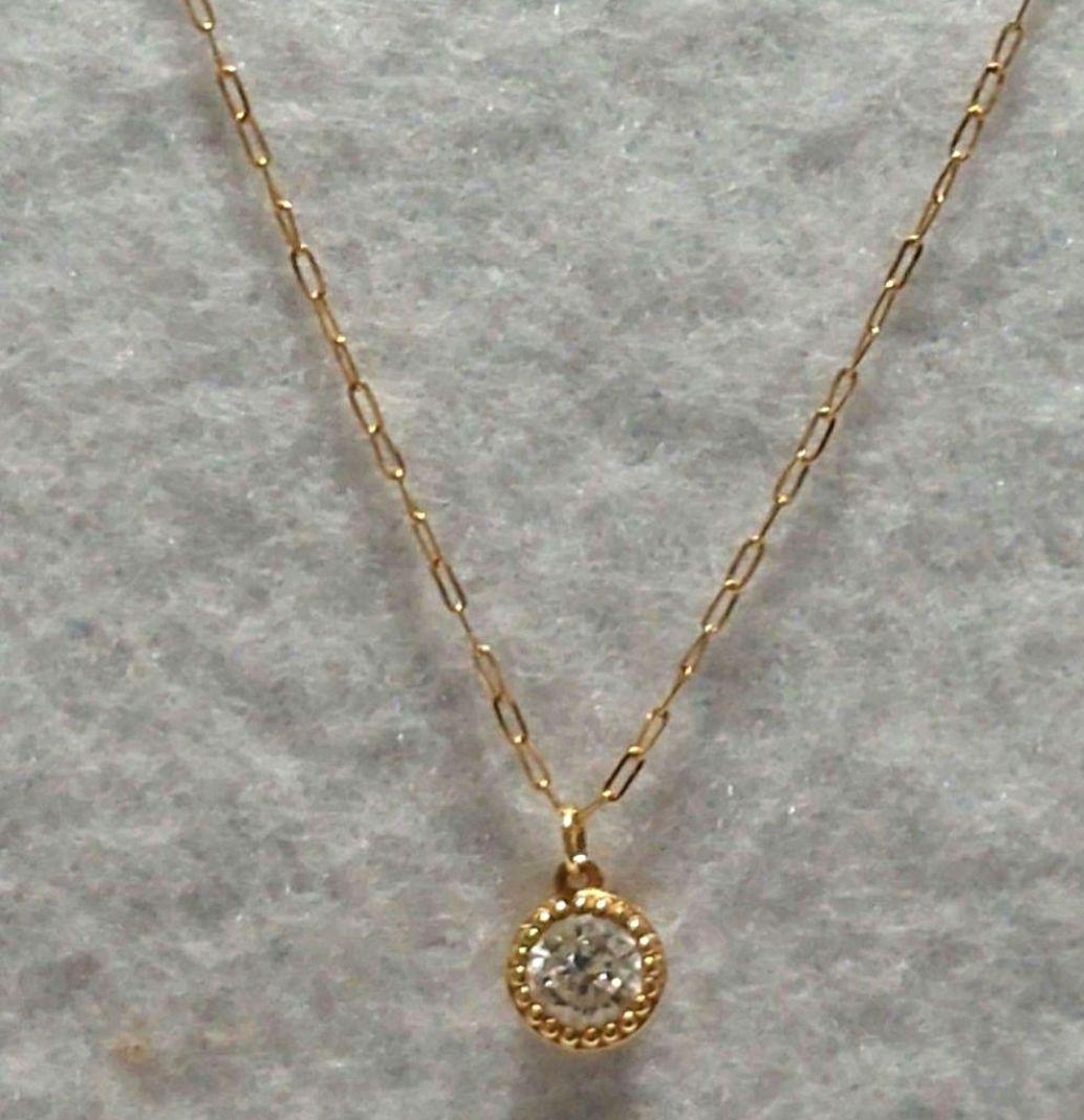Agete necklace with 0.15ct diamond set in K18 gold chain on white background