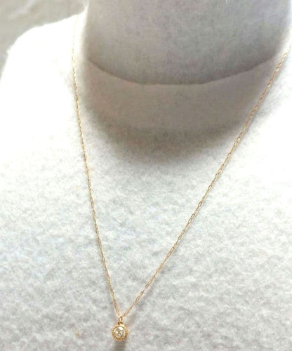 Agete necklace with 0.15ct diamond set in K18 gold chain on white background
