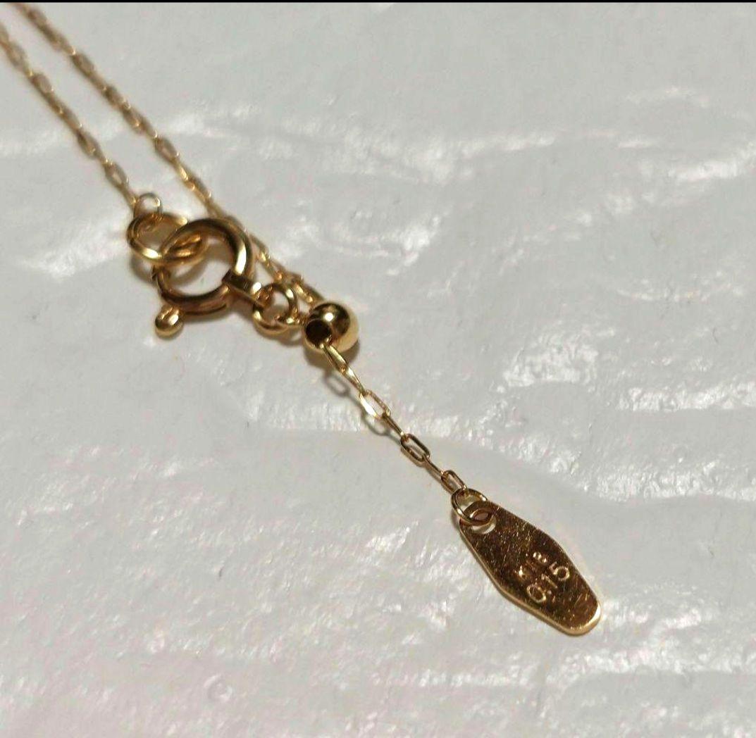 Agete necklace with 0.15ct diamond set in K18 gold chain on white background