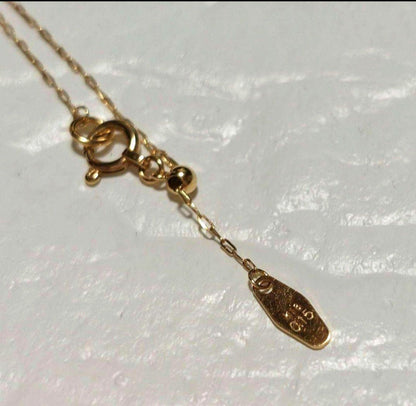 Agete necklace with 0.15ct diamond set in K18 gold chain on white background