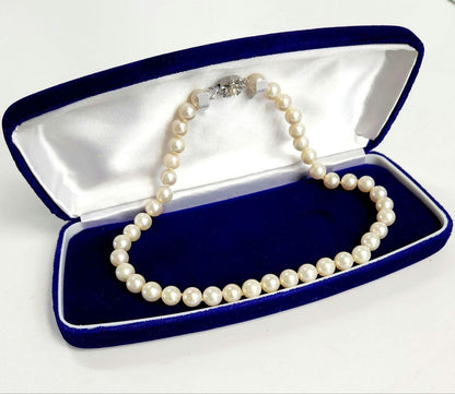 Akoya genuine pearl necklace with 9.5mm natural to cream beads on a 42cm silver chain