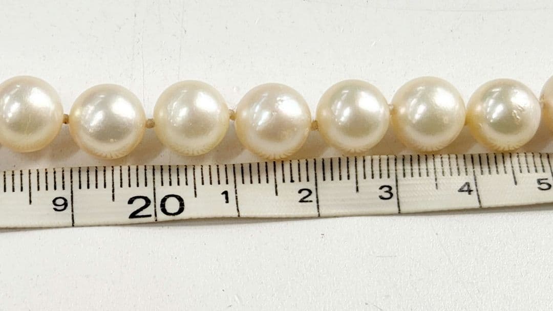 Akoya genuine pearl necklace with 9.5mm natural to cream beads on a 42cm silver chain