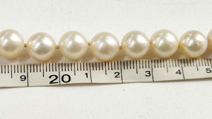 Akoya genuine pearl necklace with 9.5mm natural to cream beads on a 42cm silver chain