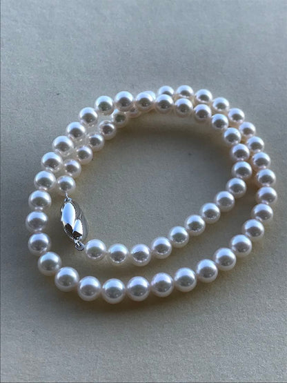 New Akoya Pearl Necklace featuring 7.5 mm round pink-based white pearls with appraisal certificate