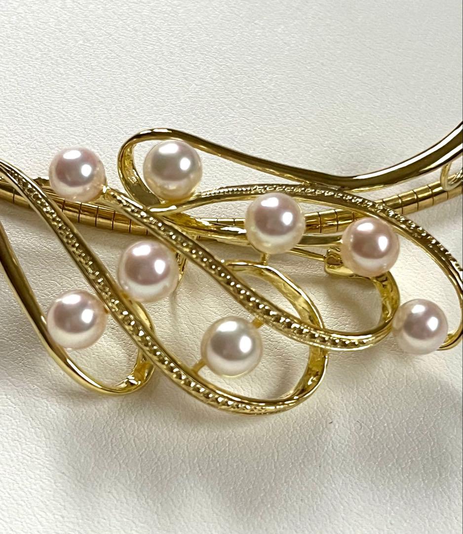 Akoya pearl silver choker necklace with gold color accents and matching brooch measuring 66mm by 30mm