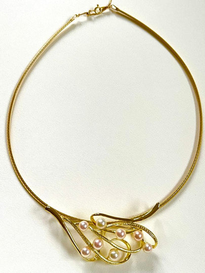 Akoya pearl silver choker necklace with gold color accents and matching brooch measuring 66mm by 30mm
