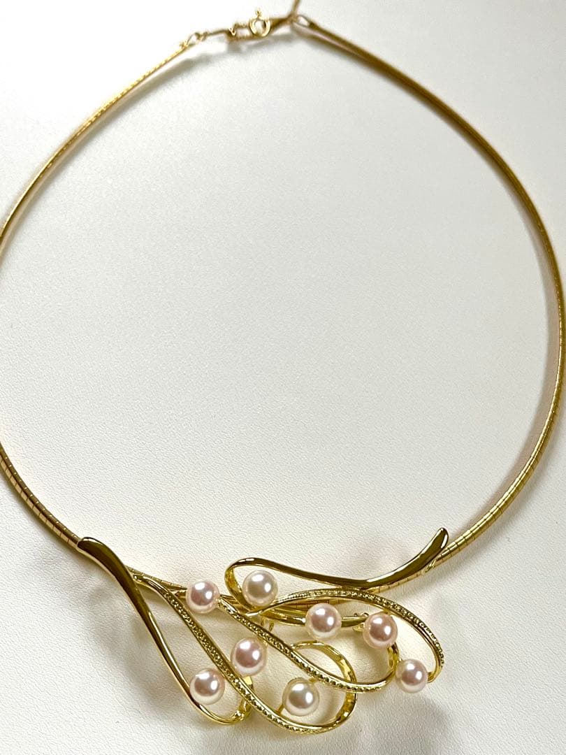 Akoya pearl silver choker necklace with gold color accents and matching brooch measuring 66mm by 30mm