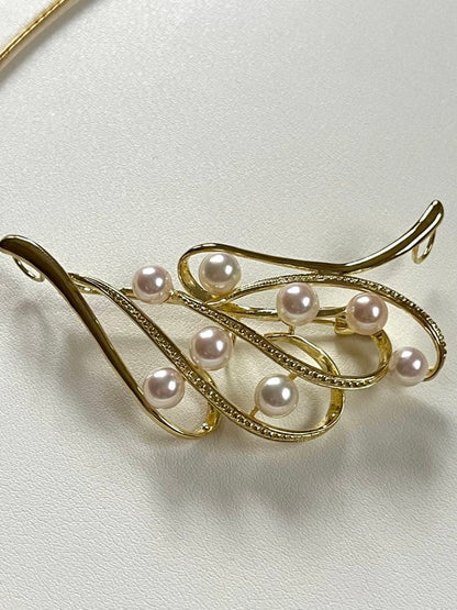 Akoya pearl silver choker necklace with gold color accents and matching brooch measuring 66mm by 30mm