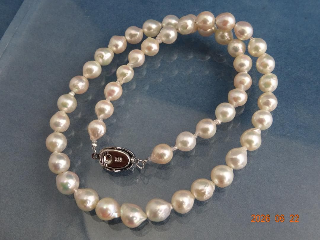 Akoya Pearl Necklace featuring 7-7.5mm baroque pearls in white, pink, blue, and cream colors with one-touch clasp