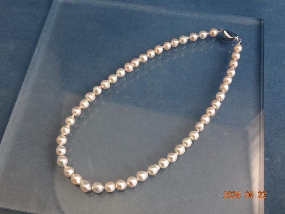 Akoya Pearl Necklace featuring 7-7.5mm baroque pearls in white, pink, blue, and cream colors with one-touch clasp