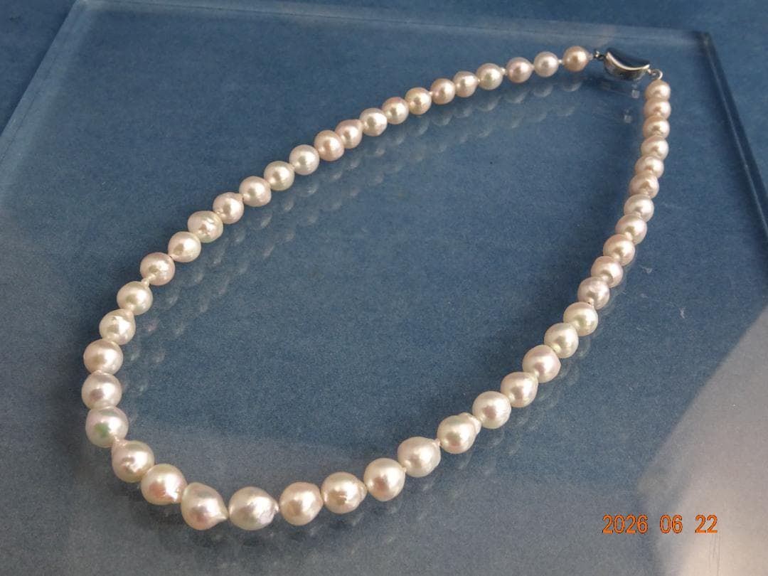 Akoya Pearl Necklace featuring 7-7.5mm baroque pearls in white, pink, blue, and cream colors with one-touch clasp