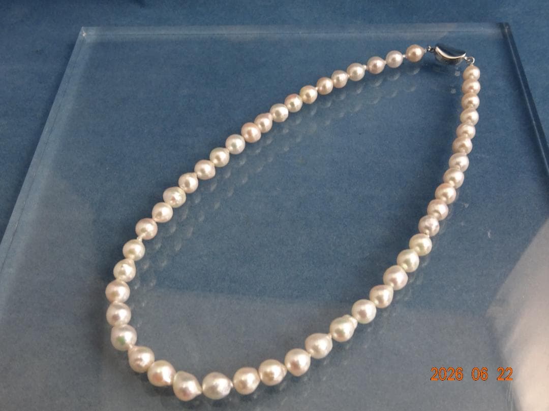Akoya Pearl Necklace featuring 7-7.5mm baroque pearls in white, pink, blue, and cream colors with one-touch clasp
