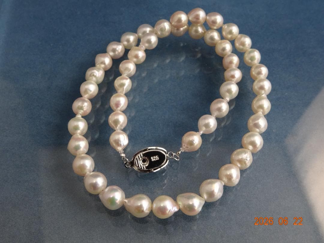 Akoya Pearl Necklace featuring 7-7.5mm baroque pearls in white, pink, blue, and cream colors with one-touch clasp