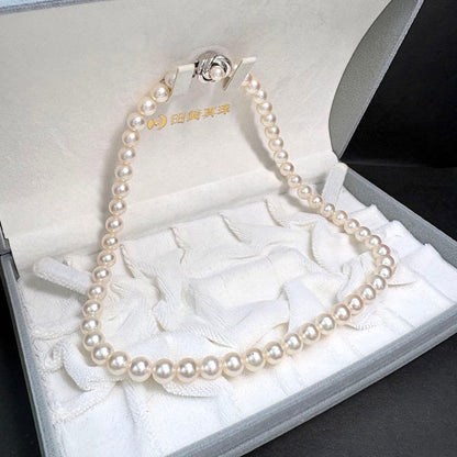 Tasaki Akoya Pearl Necklace featuring 7.5-8mm pearls with silver clasp, 43cm length
