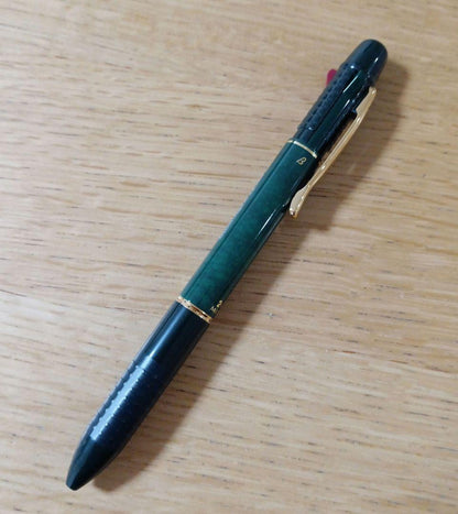 Pilot Midy 2+1 multi-function pen with dark green barrel and black and red ink tips