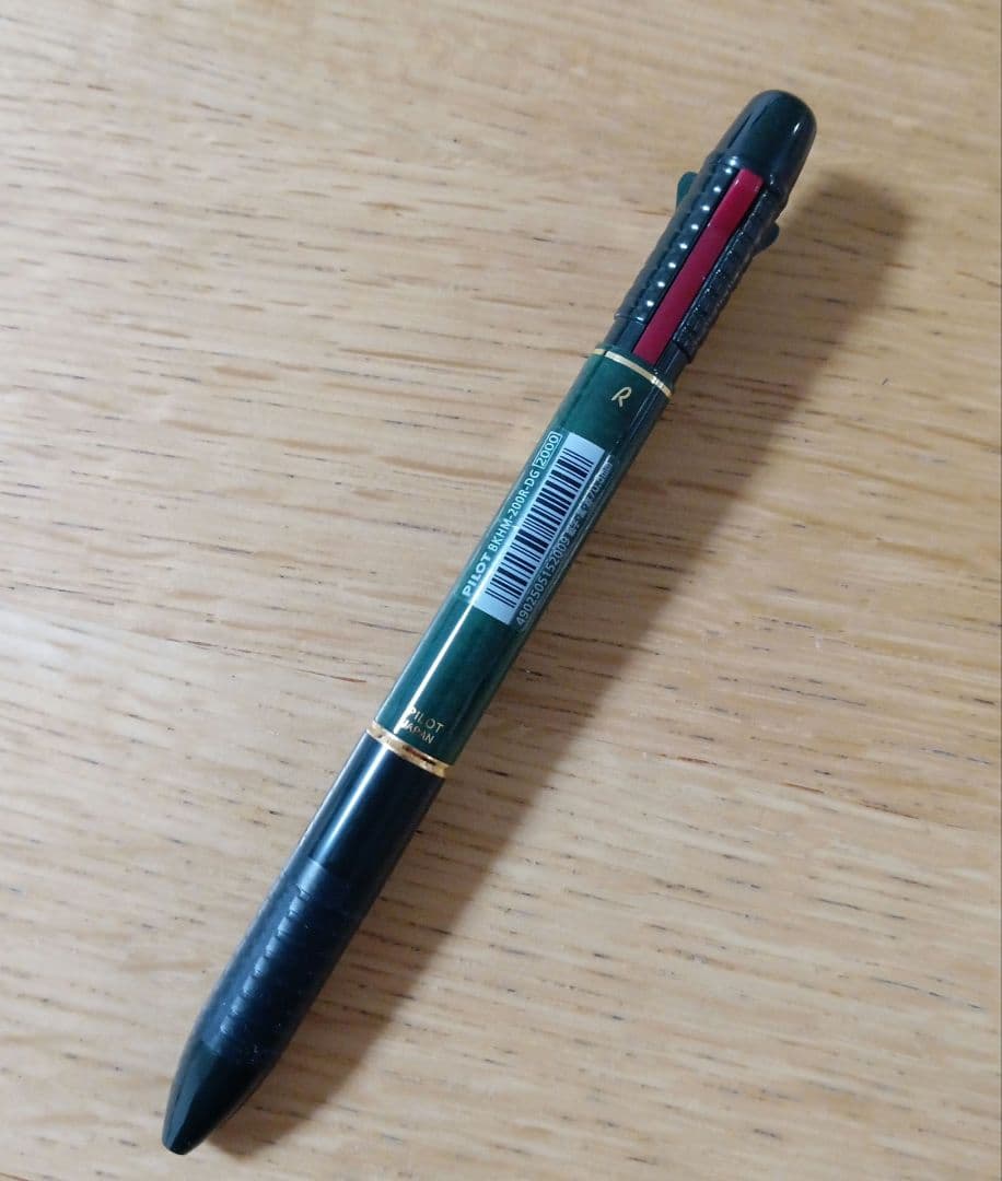 Pilot Midy 2+1 multi-function pen with dark green barrel and black and red ink tips