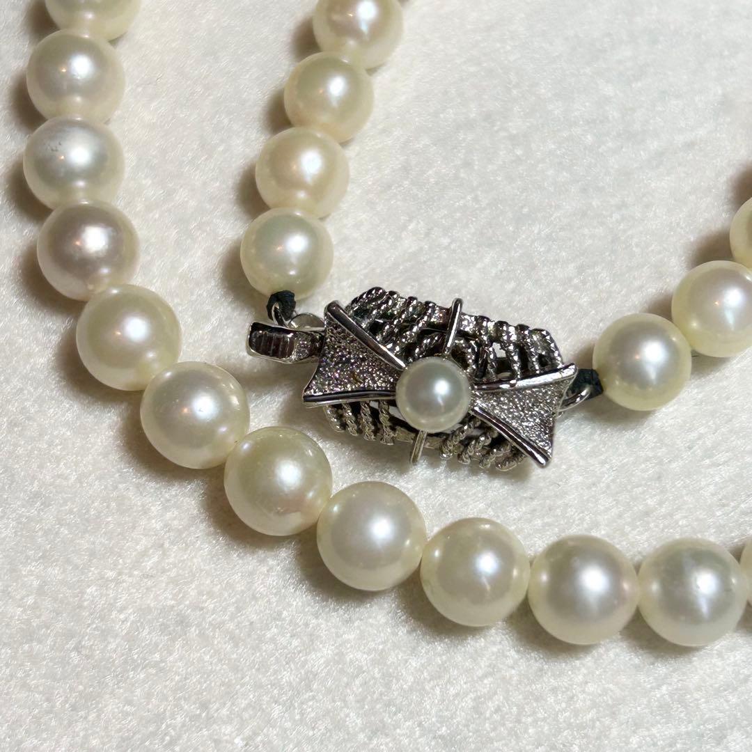 Akoya pearl necklace featuring 7mm to 6.5mm pearls on a 40cm strand with silver stamp