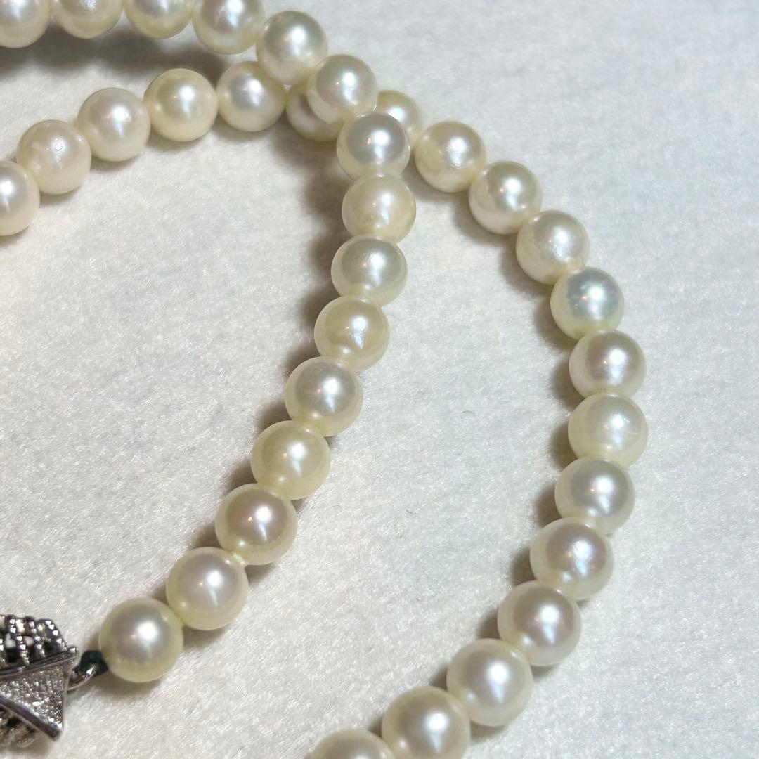 Akoya pearl necklace featuring 7mm to 6.5mm pearls on a 40cm strand with silver stamp