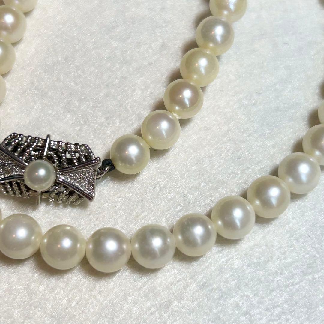 Akoya pearl necklace featuring 7mm to 6.5mm pearls on a 40cm strand with silver stamp