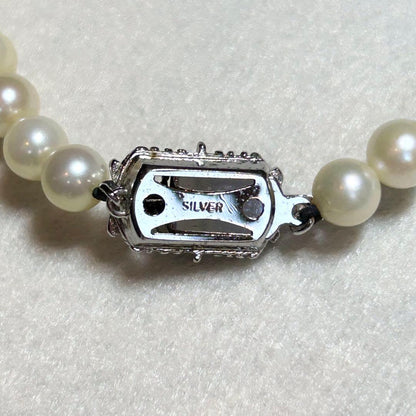 Akoya pearl necklace featuring 7mm to 6.5mm pearls on a 40cm strand with silver stamp