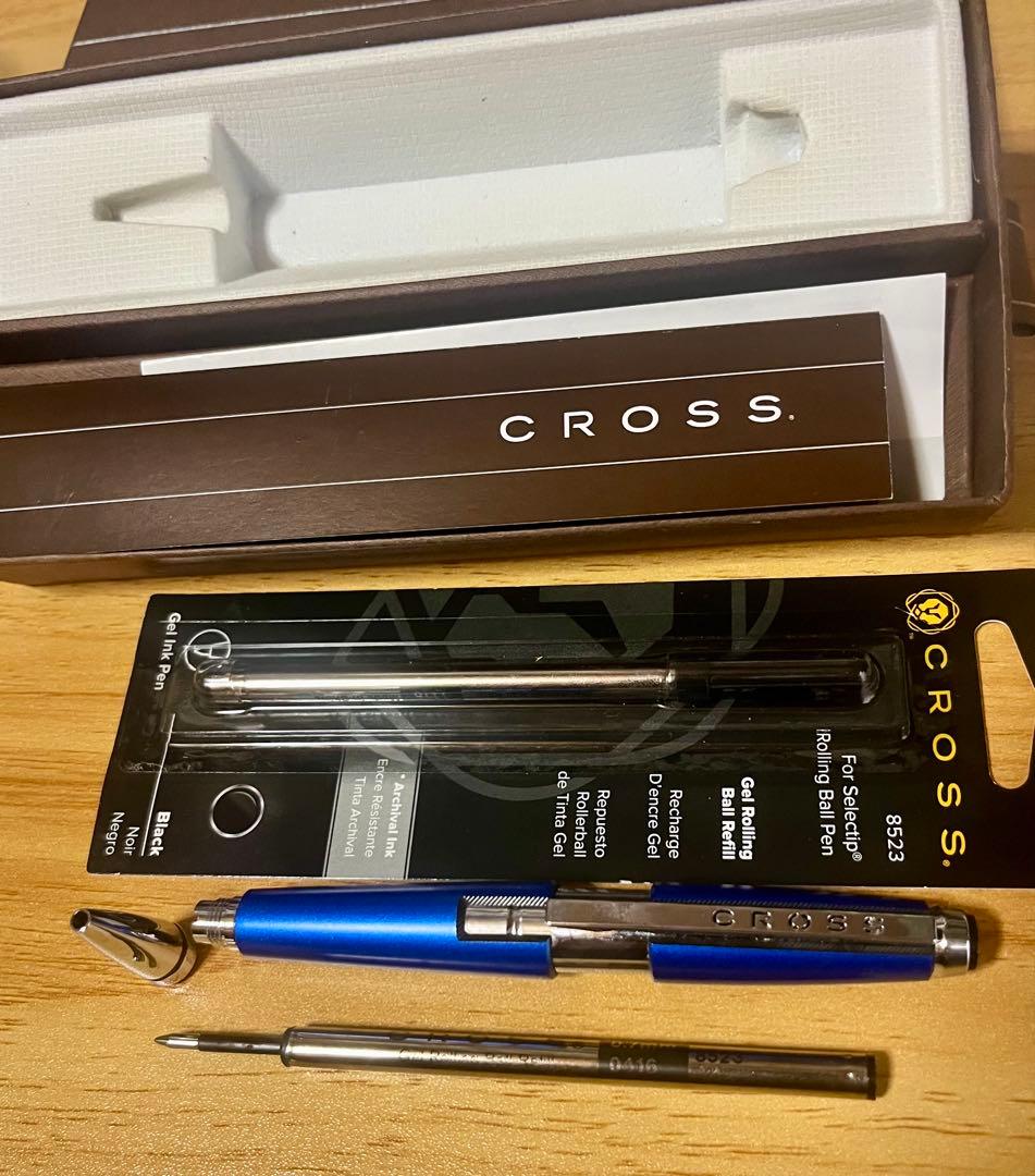 Kuro Cross rollerball pen in blue with included refill, showing a classic design