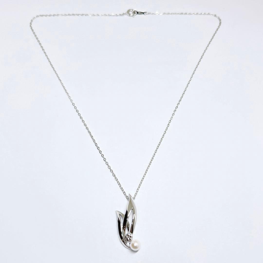 MIKIMOTO Baby Pearl Necklace with 5.1mm pearls and chrysanthemum mon pendant on silver chain