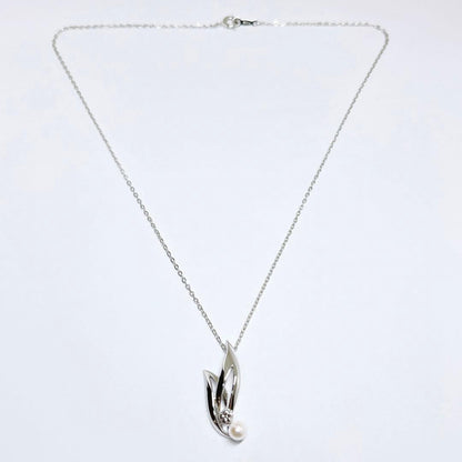 MIKIMOTO Baby Pearl Necklace with 5.1mm pearls and chrysanthemum mon pendant on silver chain