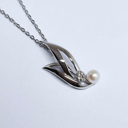MIKIMOTO Baby Pearl Necklace with 5.1mm pearls and chrysanthemum mon pendant on silver chain